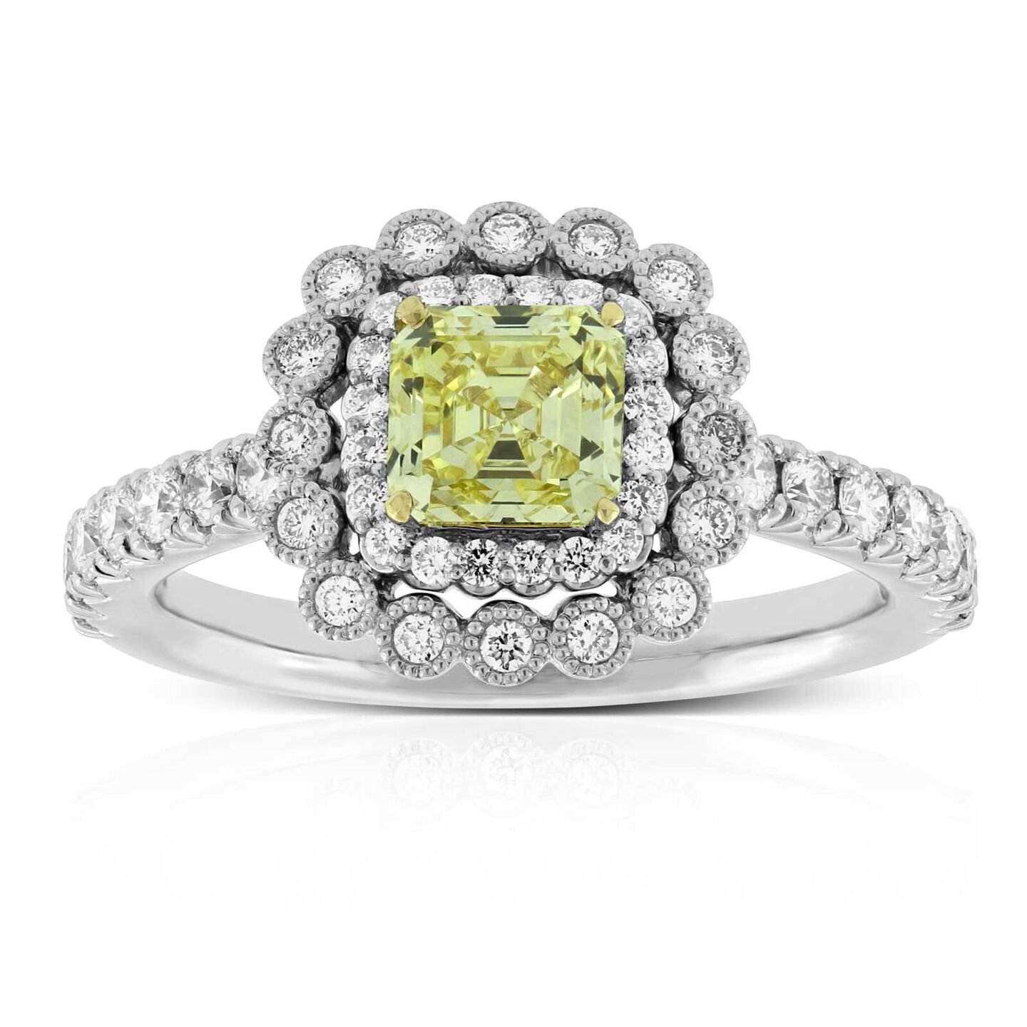 Asscher cut yellow diamond halo engagement ring sparkle against a white background