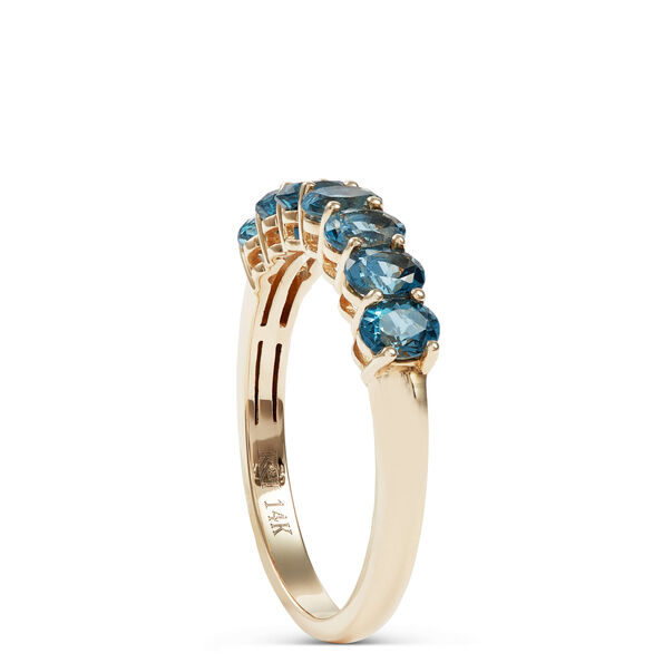 7 Oval Blue Topaz Ring, 14K Yellow Gold